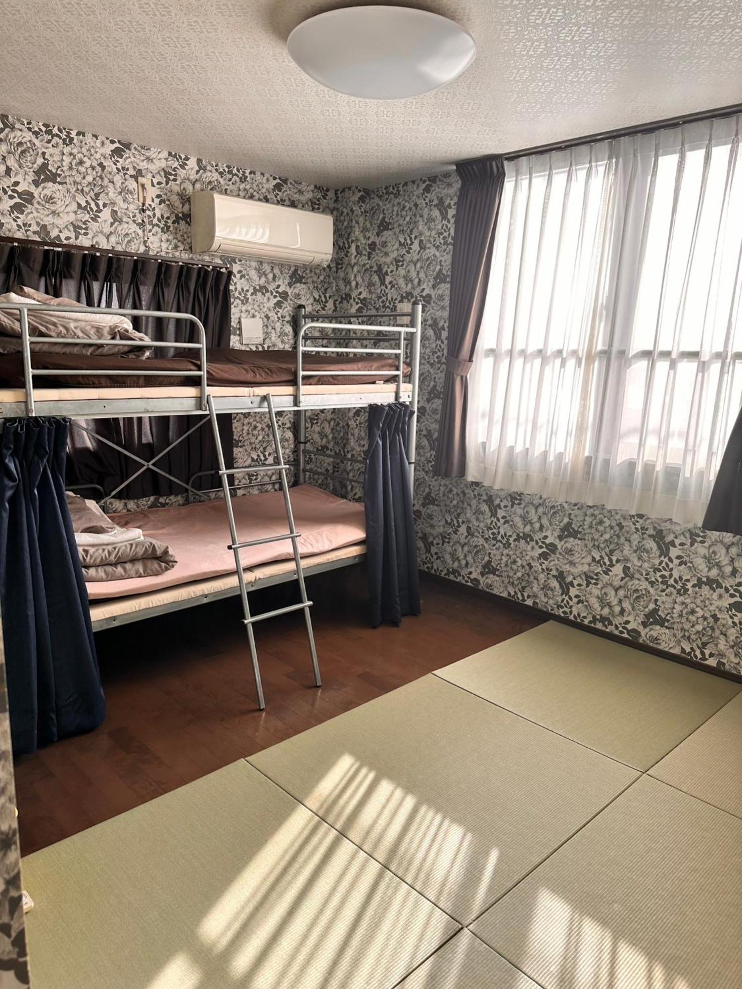 Guesthouse Tiga Kumamoto Luaran gambar