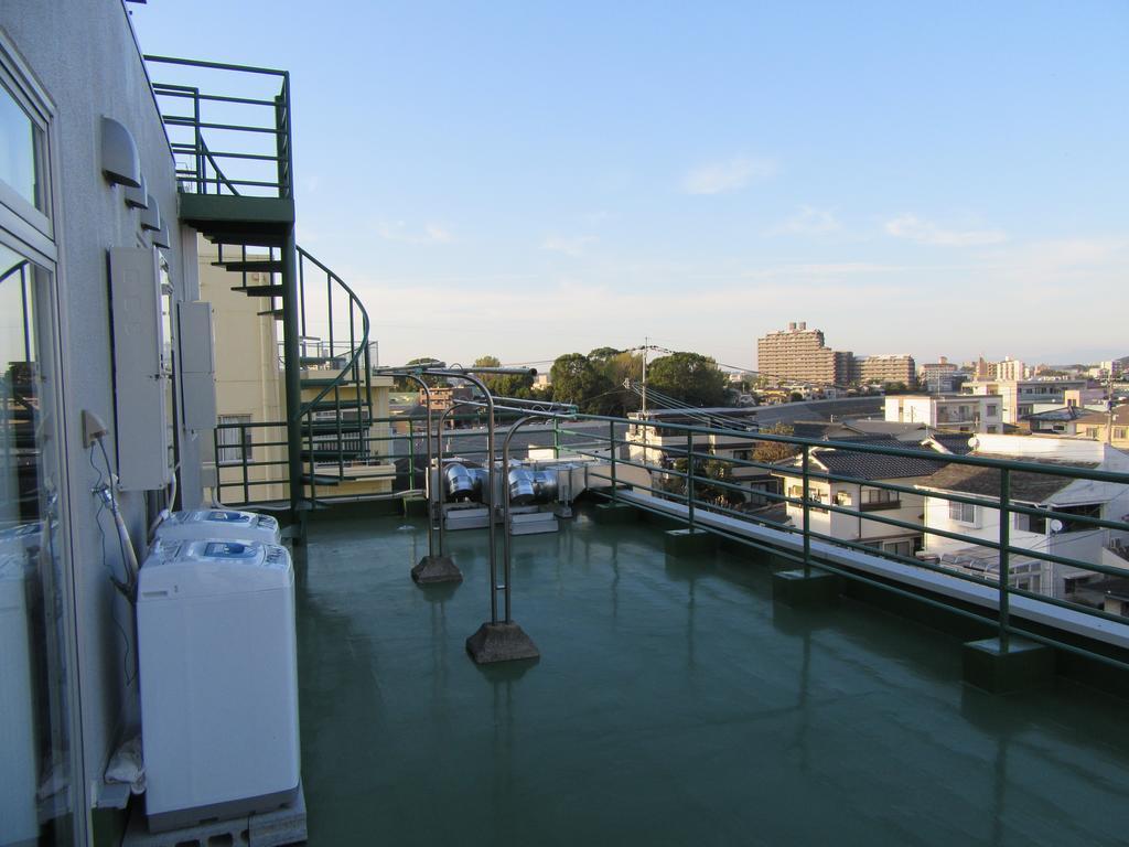 Guesthouse Tiga Kumamoto Luaran gambar