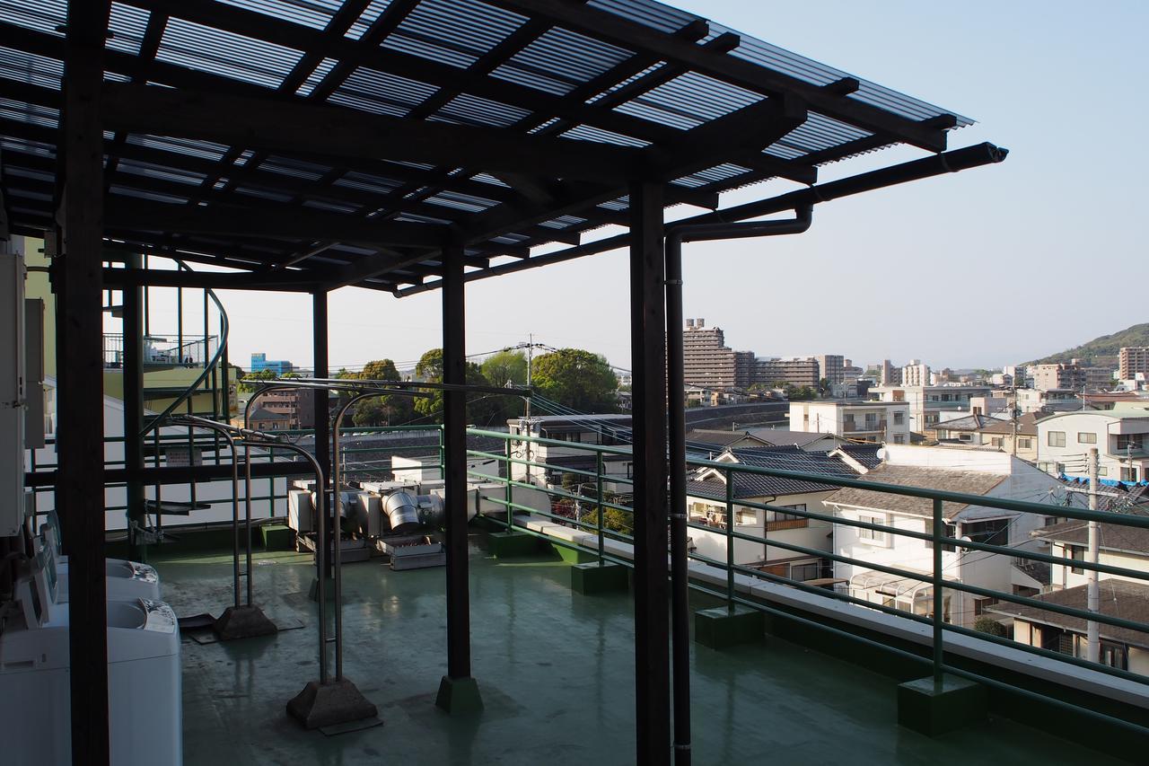 Guesthouse Tiga Kumamoto Luaran gambar